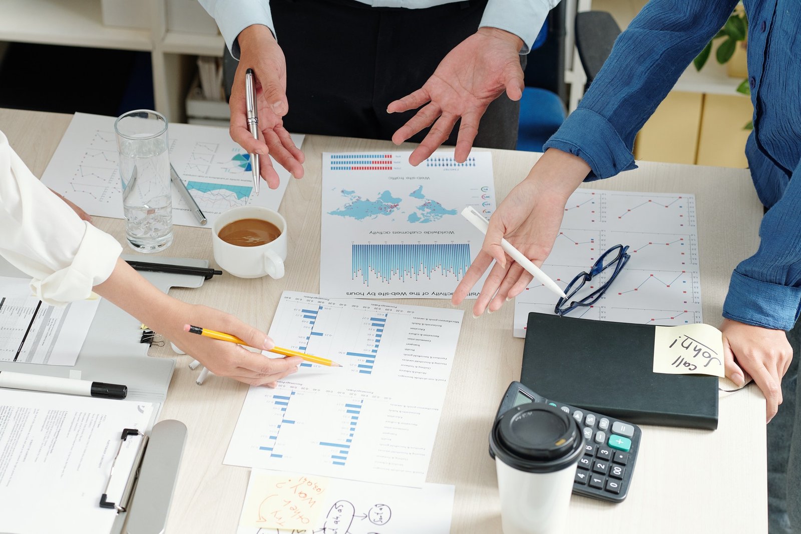 Business professionals reviewing financial statements